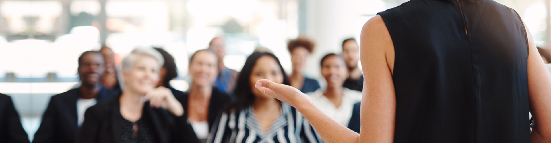 Woman presenting to an audience