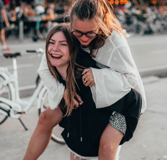 Two women have a joyful time