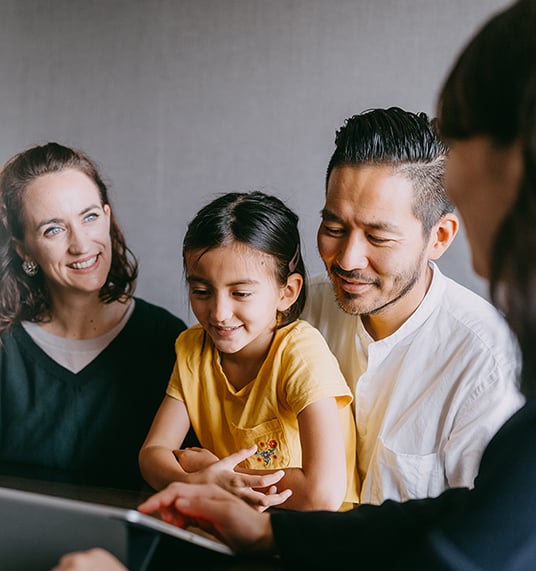 Family listening to sales representative